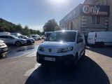 a white van that is parked in a parking lot