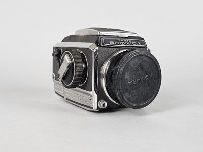 a small camera that is sitting on a table