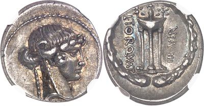 a close up of a silver coin with a woman on it