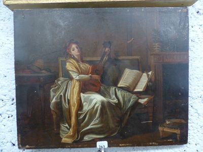un tableau représentant une femme en train de lire un livre, accroché au mur