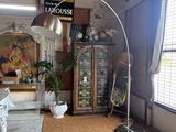 a living room with a couch and a lamp in it