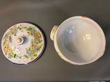 a bowl and a saucer sitting on a table