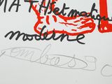 a drawing of a shoe on a white sheet of paper with writing on it