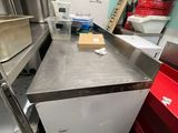 a kitchen that has a lot of counter space in it