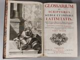 a book with a picture of a woman sitting on a bench
