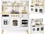 four pieces of white kitchen furniture that are on display