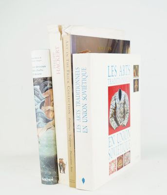 two books that are sitting next to each other on a table
