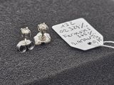 a tag that has a picture of a pair of earrings on it