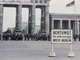a lot of soldiers standing in front of a building