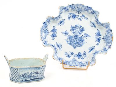 DELFT, XVIIIE Un plat à bordure chantournée et un beurrier