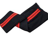 a pair of black pants with red stripes on them