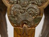 a close up of a wooden table with a bird on it