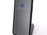 the iphone is sitting on top of a stand with a phone on it