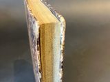 a close up of a book on a table