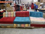 an image of a couch made out of pallets in a warehouse