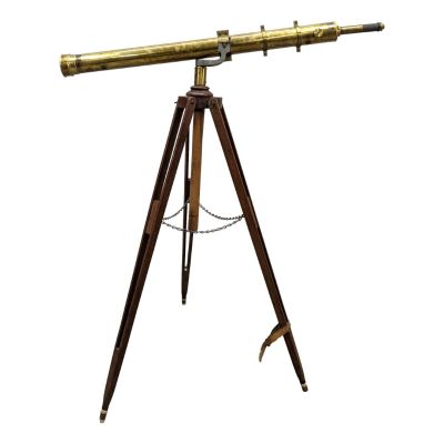 an antique brass telescope on a tripod stand
