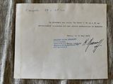 a close up of a piece of paper with a handwritten letter