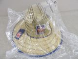a hat that is wrapped in plastic on a table