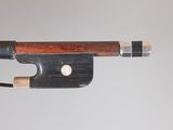 a violin bow that is attached to a string