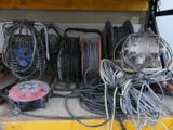 a bunch of wires and other electrical equipment on a shelf