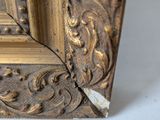 an image of a close up of a gold frame on a white surface