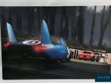a picture of a painting of a race car on the track
