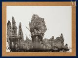 photograph of a black and white photo of a rock formation in the desert
