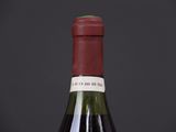 a bottle of wine that is sitting on a table