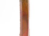a tall vase that has a red and gold design on it