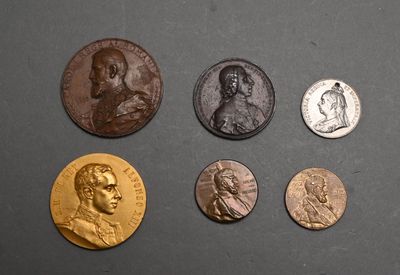 a close up of a bunch of coins on a table