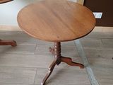 two small tables that are sitting on the floor