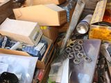 many boxes of assorted items sitting on the floor