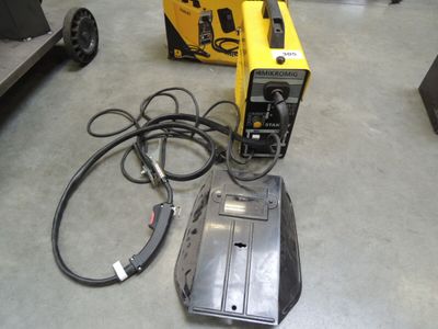 a picture of a welding machine and other equipment on the floor