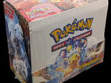 une boîte de cartes à collectionner Pokémon sur fond noir