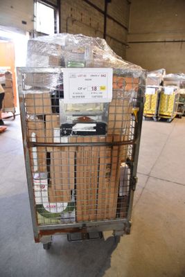 a cart with a lot of boxes on it in a warehouse