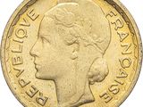 a close up of a coin with a woman ' s face on it