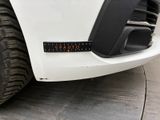 a close up of a car ' s front bumper with the word vulcan on it