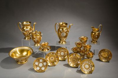 a lot of gold items that are sitting on a table