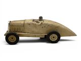 a toy car that is sitting on a white surface