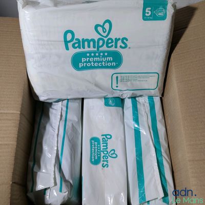 a box full of baby diapers sitting on a table