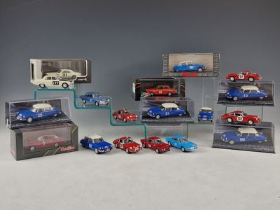 a lot of toy cars on display in a display case