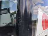 a bus that is parked on the side of the road