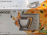 packaging of a kenwood stand mixer on display in a store