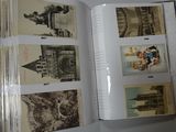 an open book with pictures of buildings on it