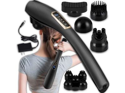 the woman is using a hair dryer to style her hair