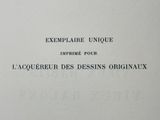 a close up of a white book with black writing on it