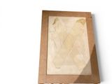 a picture of a picture of a woman in a dress in a box