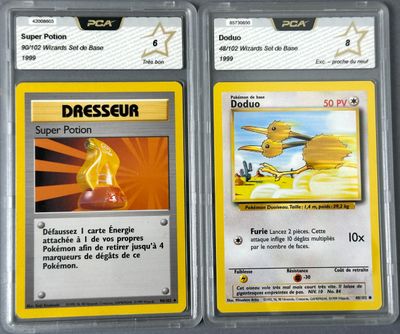 two pokemon trading cards are displayed in a plastic case