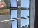a picture of a window that has a lot of pictures on it