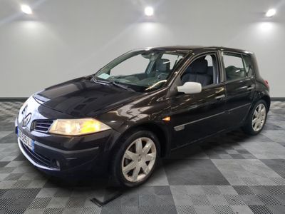 a picture of a black car parked in a garage